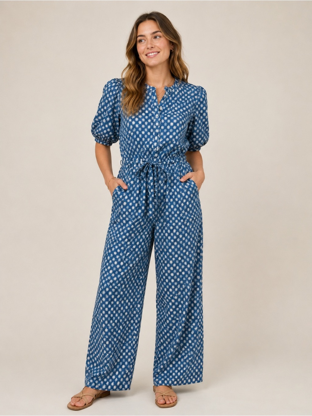 Blue jumpsuit with white print